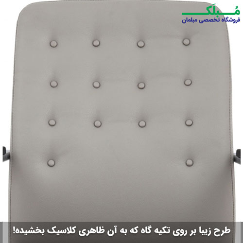 نمایی نزدیک از پشتی صندلی کنفرانسی ال اس که با دکمه لمسه کاری شده است.